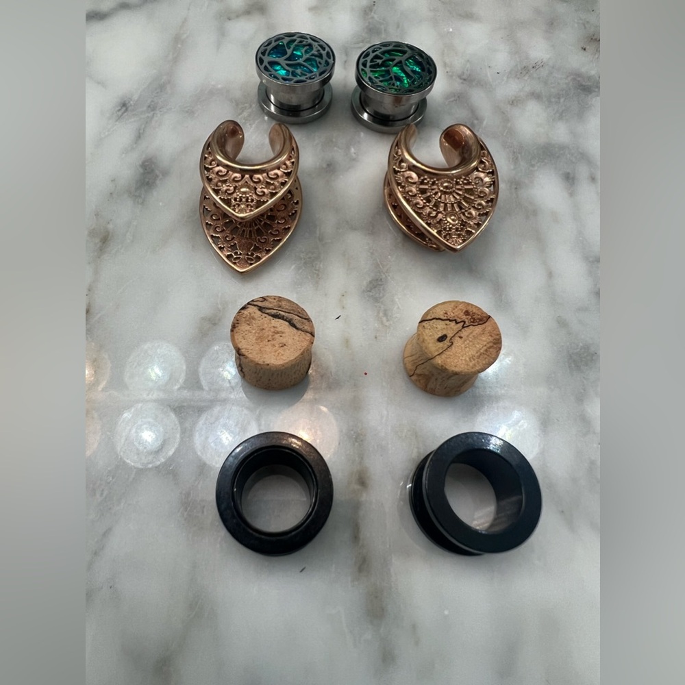 Stainless steel and wood plugs (gauges) size 9/16